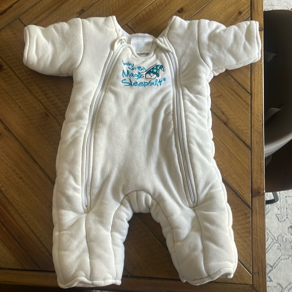 Small magic Merlin suit in white. No stains and non smoking home.